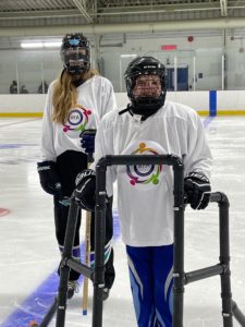 Keira and Ava using Maddie's skating machine