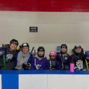 kids on bench for water break